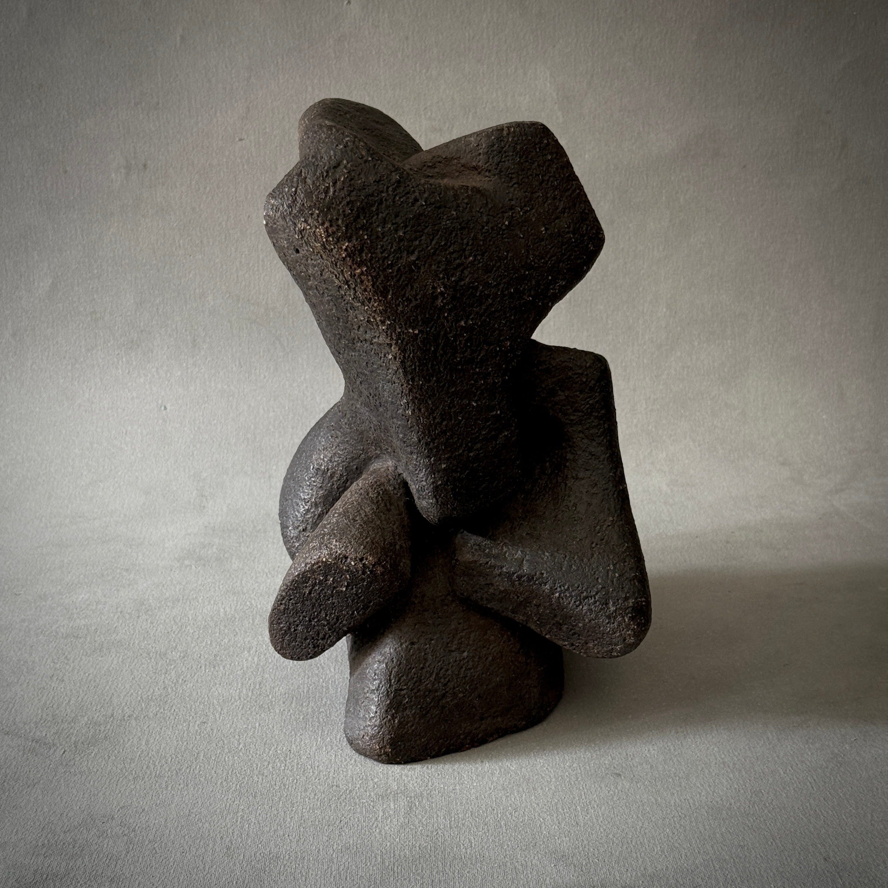 Anthropormorphic black fireclay sculpture