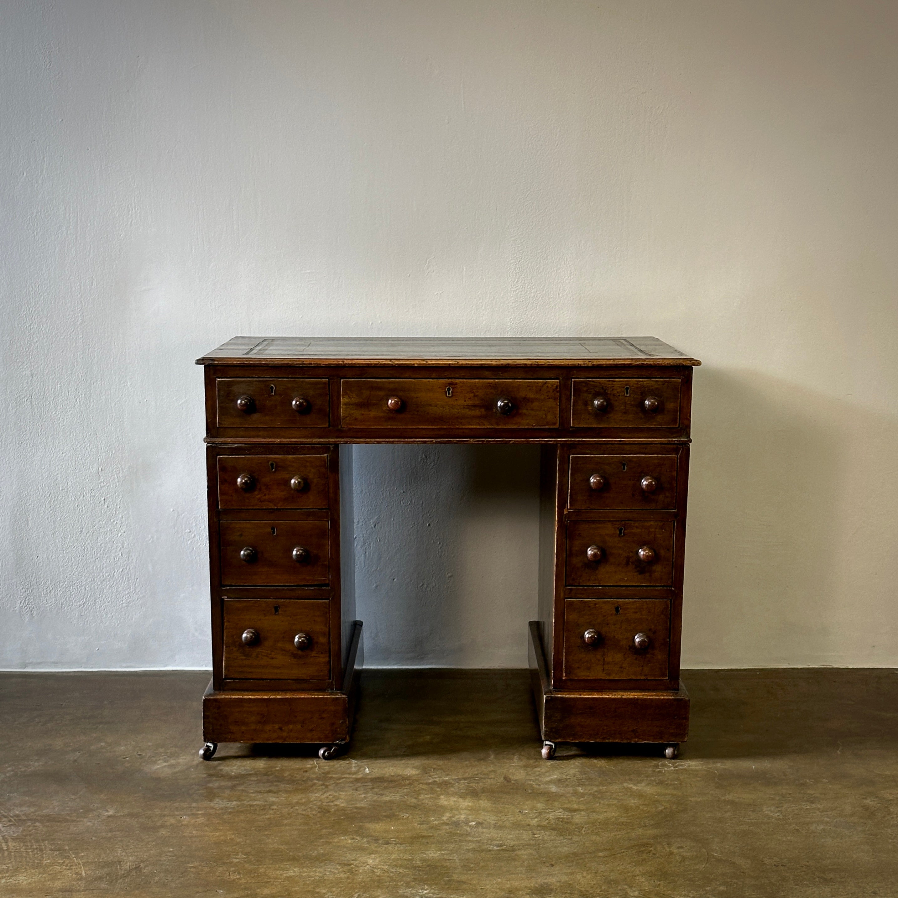 Leather Topped  Desk in Walnut