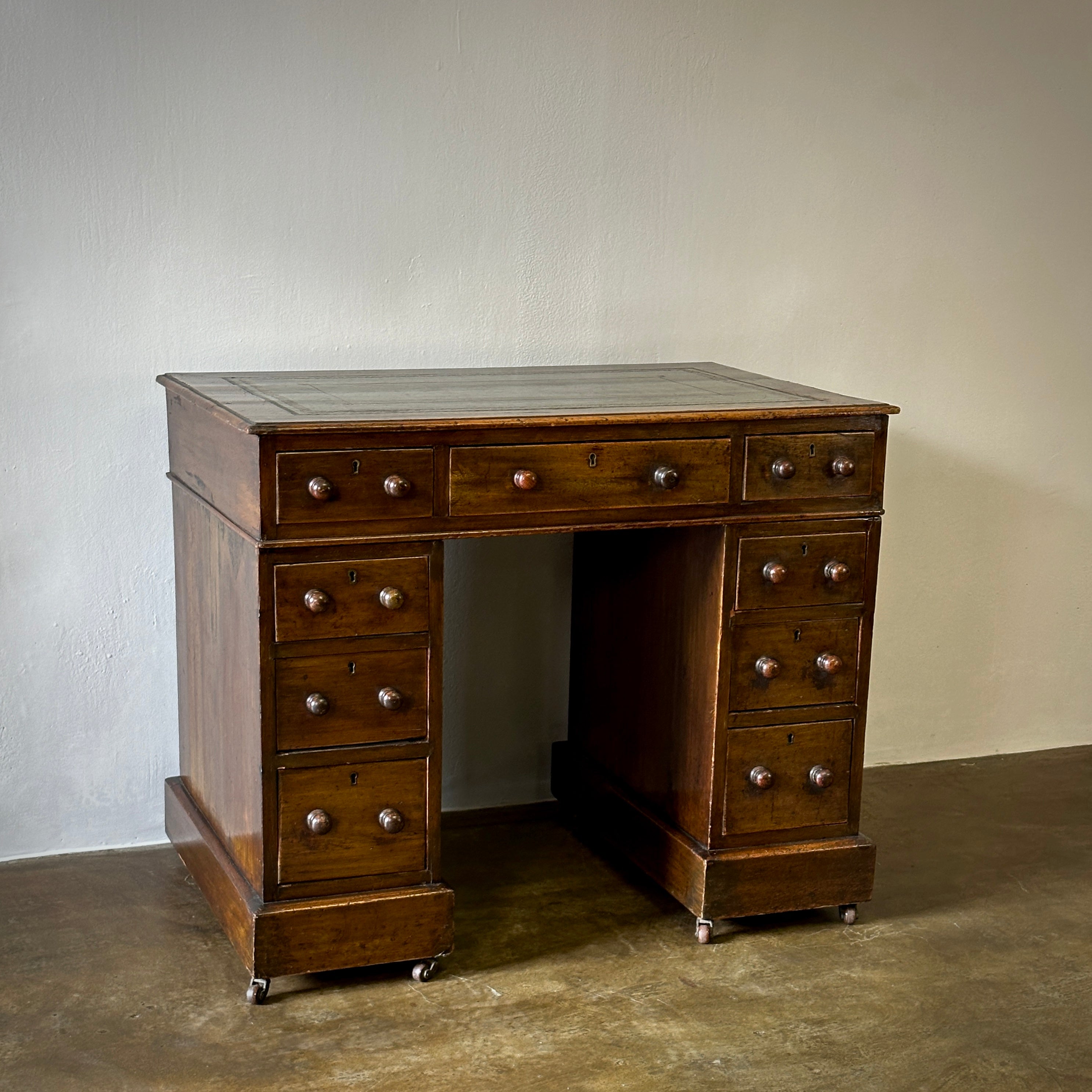 Leather Topped  Desk in Walnut