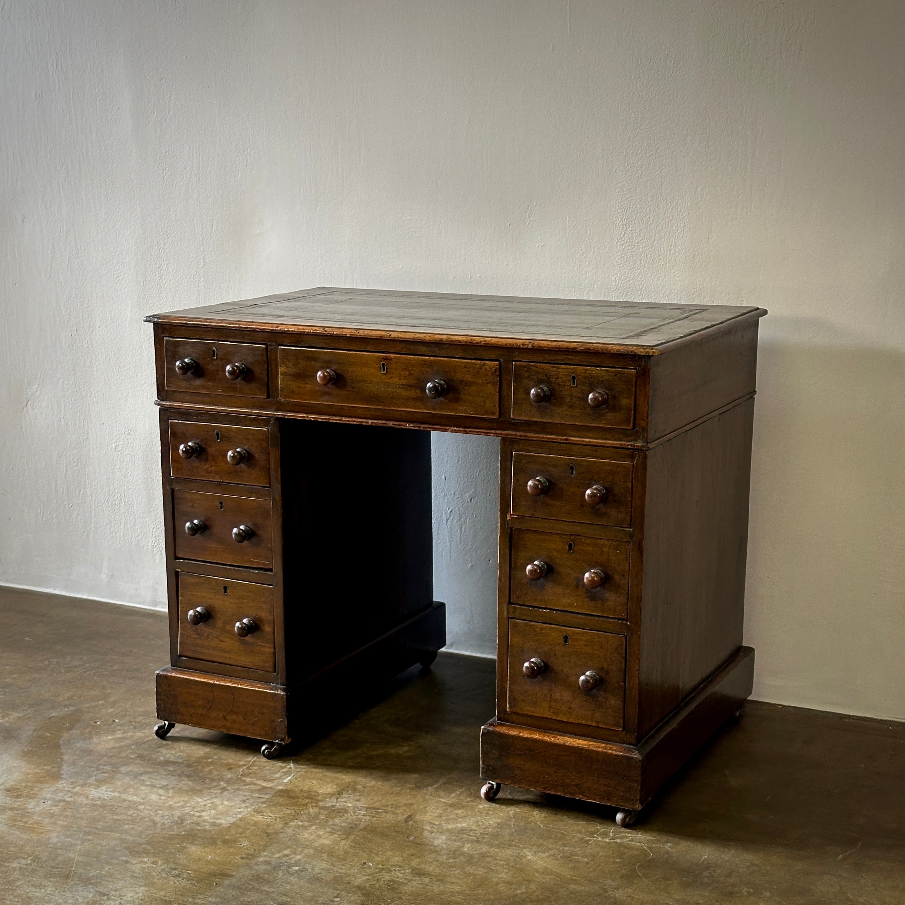 Leather Topped  Desk in Walnut