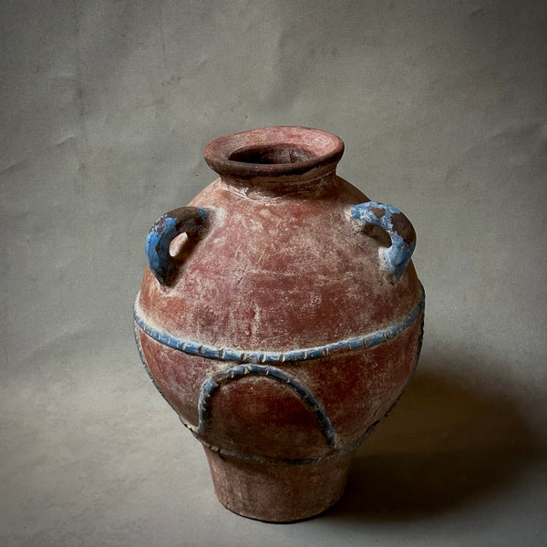 A PAINTED TERRA-COTTA VESSEL