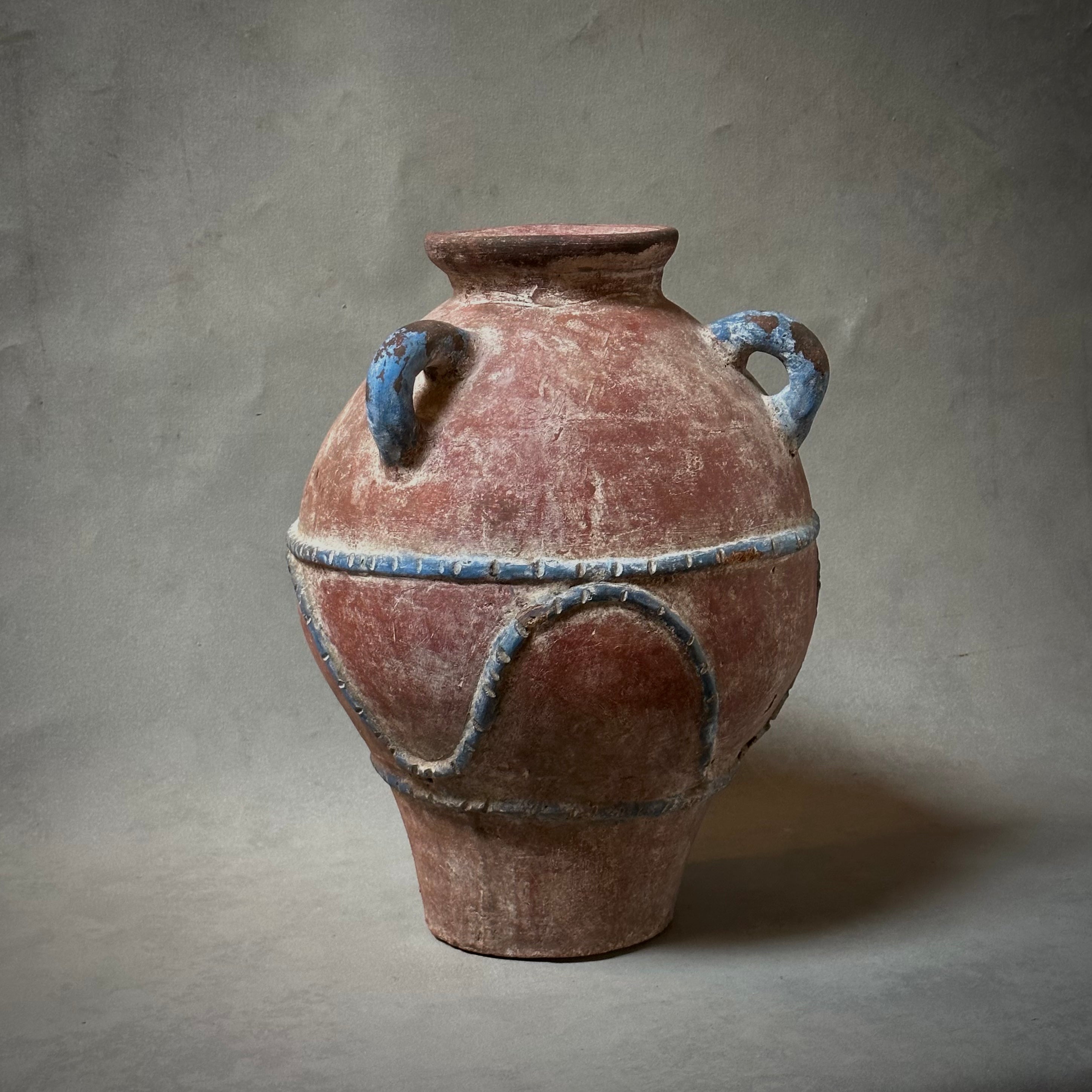 A PAINTED TERRA-COTTA VESSEL