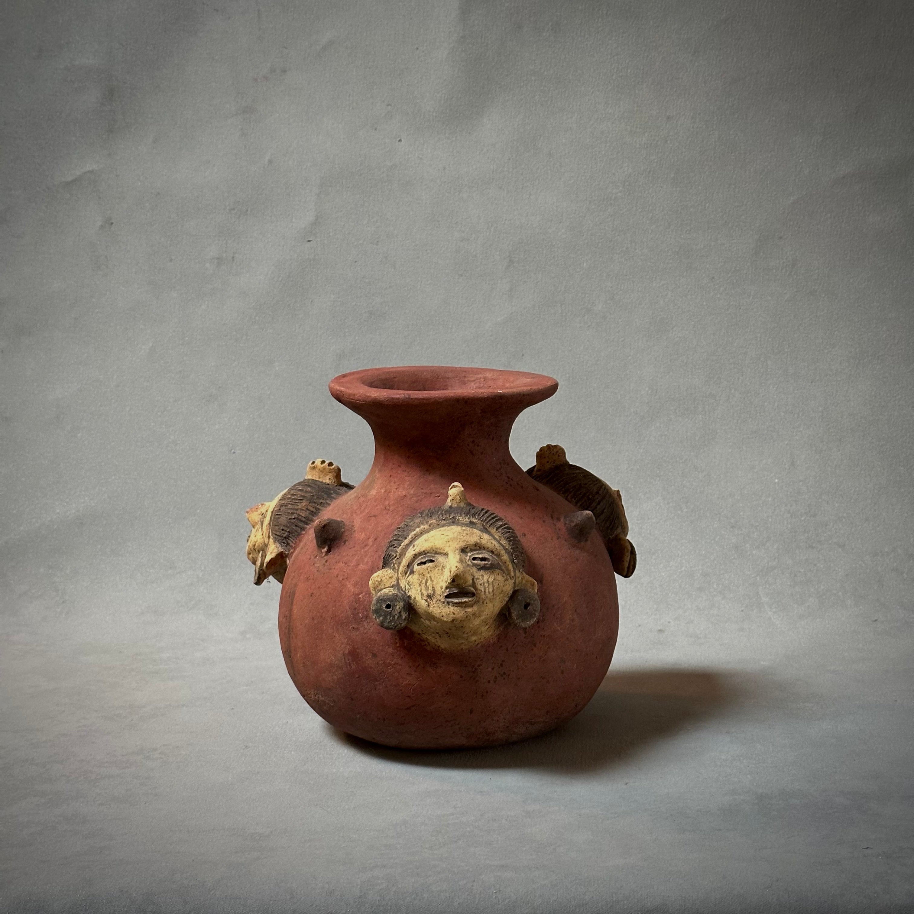 A decorative terracotta vessel